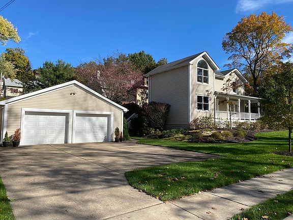 Side. The home has great curb appeal and a professionally landscaped lot.