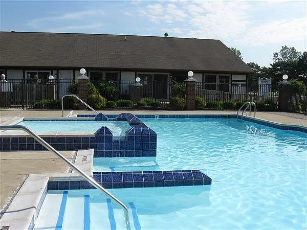 Refreshing pool with waterfall and wading pool