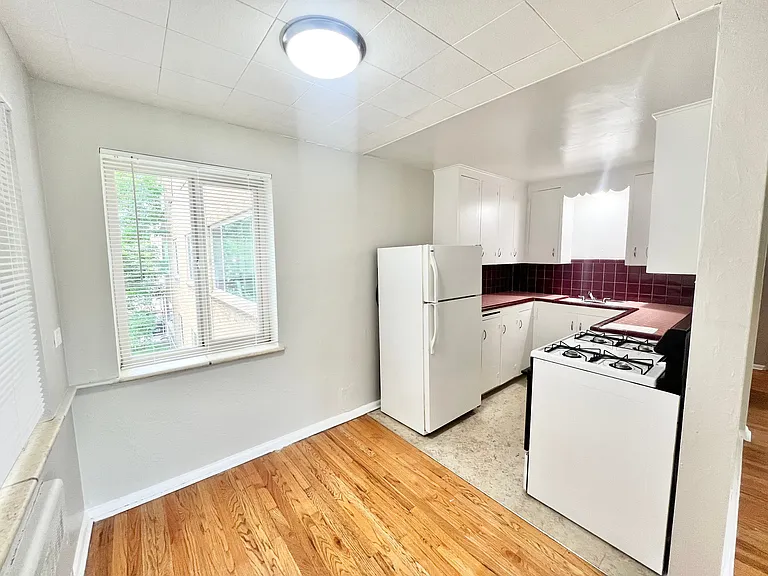 Experience the charm of this bright kitchen, perfect for culinary adventures. Experience the charm of this bright kitchen, perfect for culinary adventures.