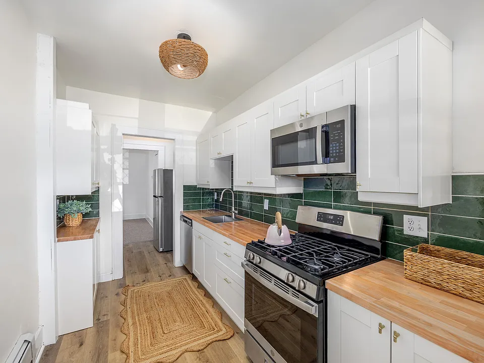 remodeled kitchen with beautiful custom tile work