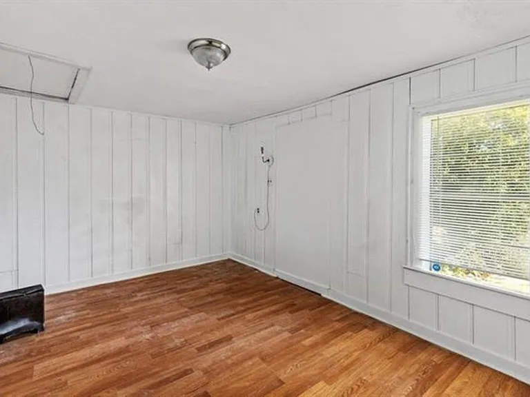 Third bedroom, first bedroom off the hallway & across from study/den area. Attic access is also in this bedroom.
Suggestion: Room always had a Queen size bed, large dresser for clothing, and an oversized chair in here. Of course you can set it up how yo