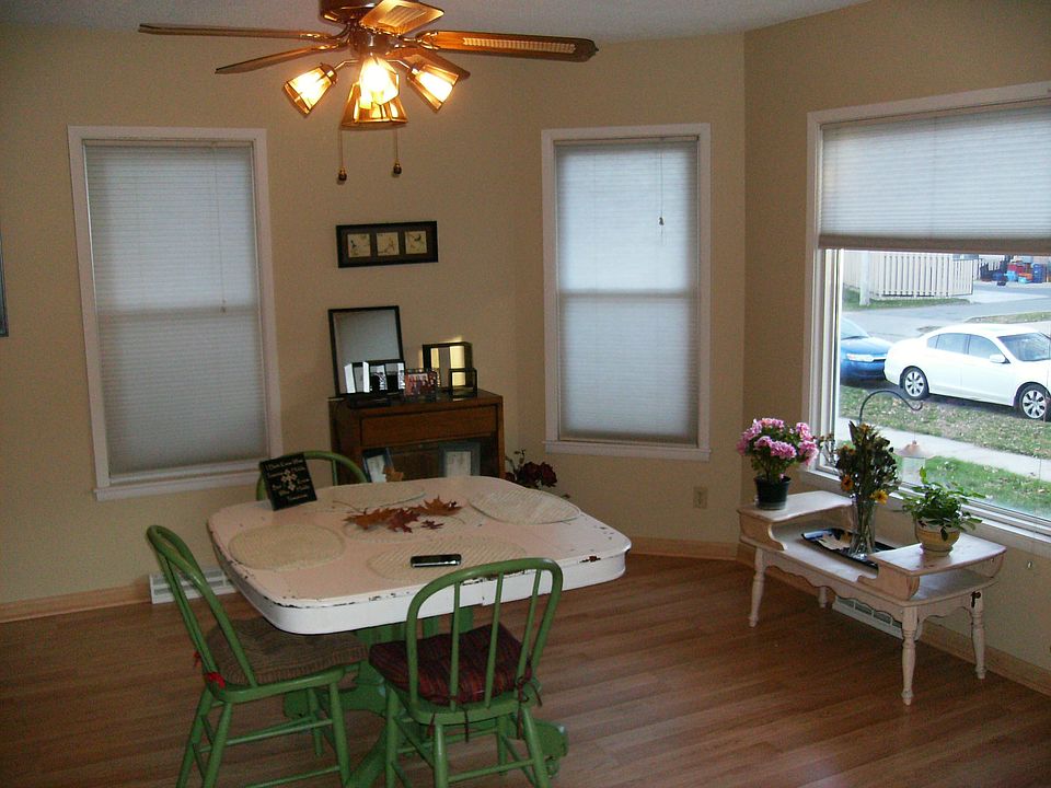 Large south facing windows in the dining room are perfect fo