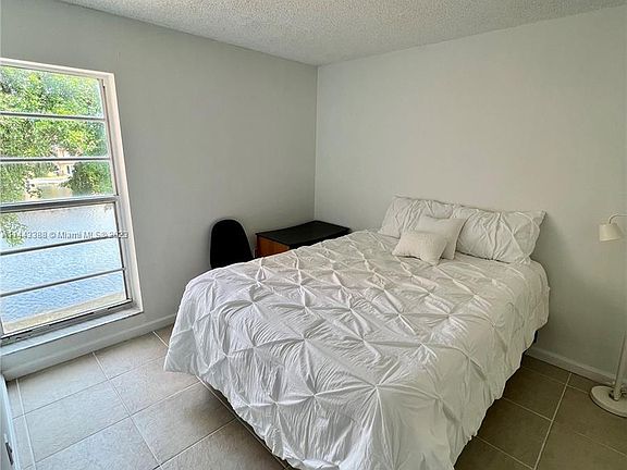 5th image of 4719 NW 7th St Unit 305
