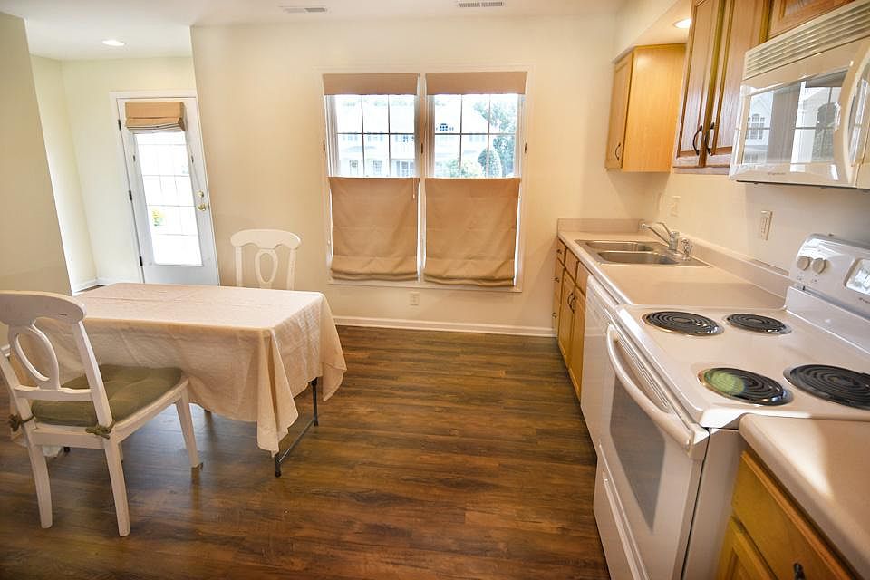 Sunny eat-in kitchen has southern exposure.