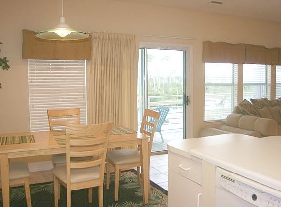Dining Table & Kitchen with lake views!