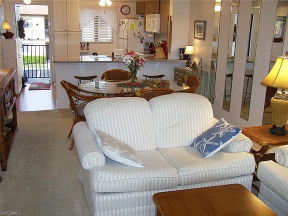 View from lanai: living/dining/and kitchen/entrance.