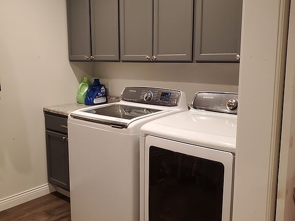 Laundry in master walk-in closet