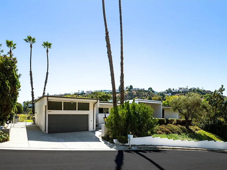 Two car garage with windows and ample storage. Acoustic covered walls. Enter home through side entry. Large gated driveway with lock. NEW SOLID STEEL GATES COMING! Motion detector lights over garage and in backyard. Hope to see you soon!