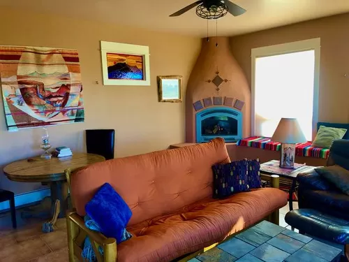 living & dining area with gas kiva fireplace & window seat - Sunrise Ol Point