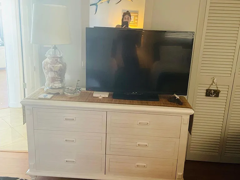 Guest bedroom tv and dresser . Guest closet hosts fishing poles and a metal detector your more then welcome to use .
