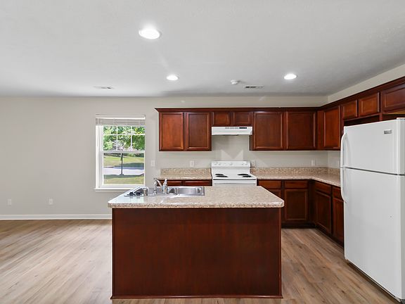 Kitchen Area. Comes with appliances (Fridge, stove, dishwasher, garbage disposal). Does not include microwave