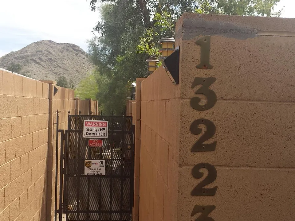 Entrance with Mailboxes, Lights, and Doorbells.