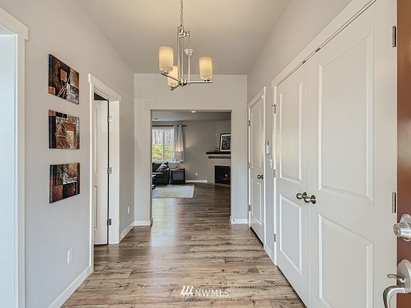 Large welcoming foyer as you enter the home. The double doors on the right are a coat closet that is the size of a mini mud room!
