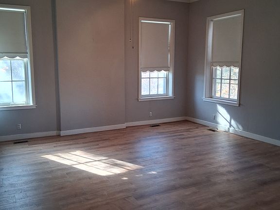Twelve foot ceilings with new laminate flooring.