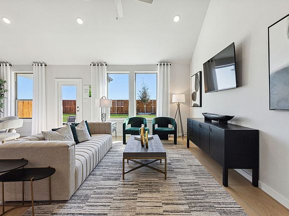 Living Room in the Winters home plan by Trophy Signature Homes - REPRESENTATIVE PHOTO