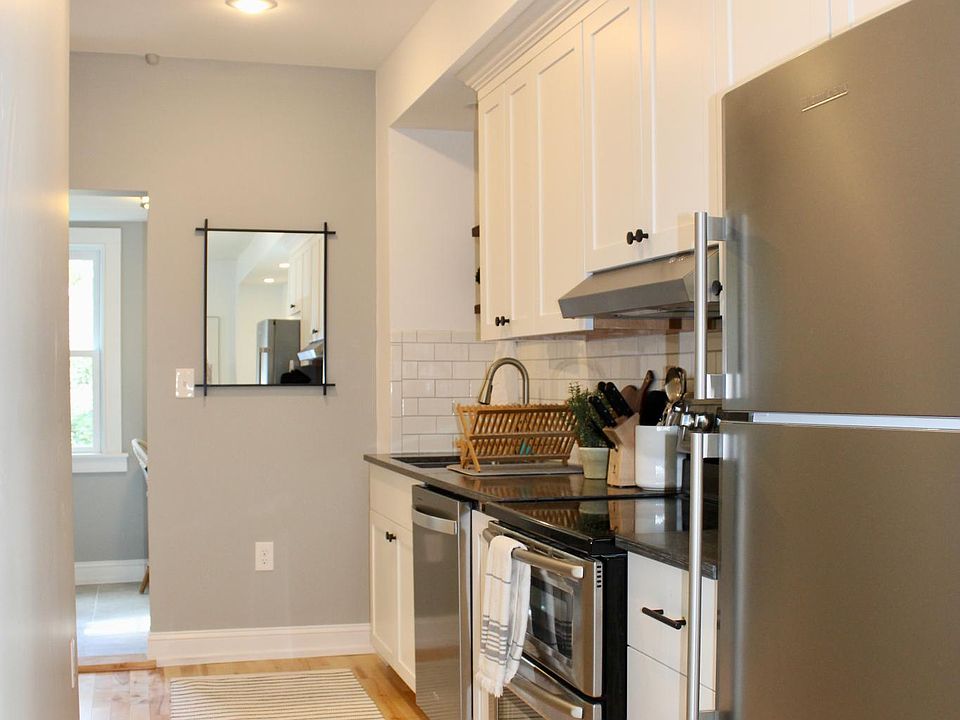 2nd floor: fully stocked galley kitchen off of living room