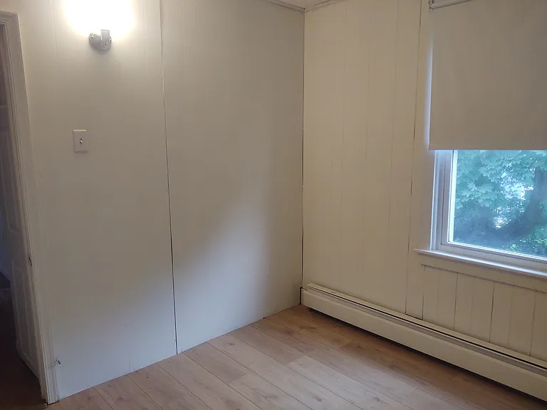 This is the smallest bedroom which would be great for a young child, an office, or even a walk in closet.