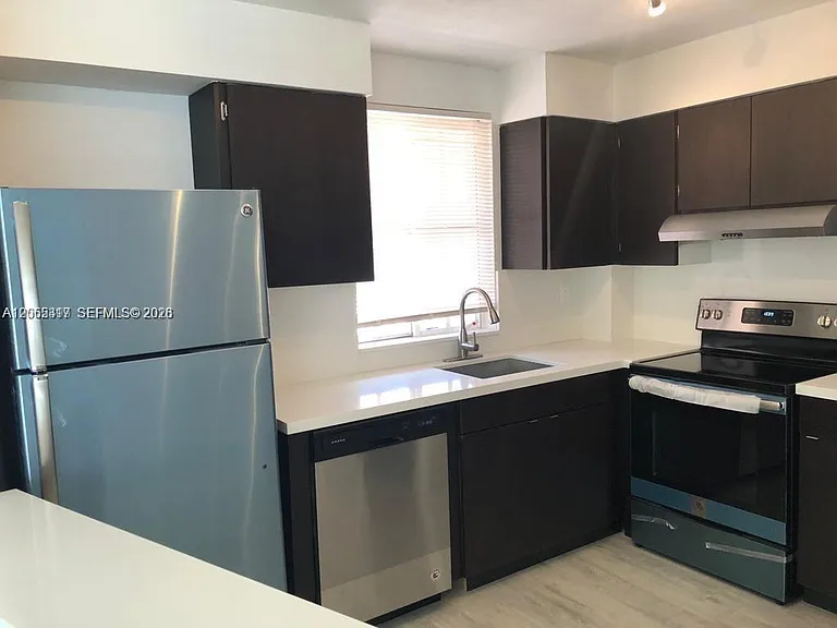 6195 NW 186th St #403 — Photo 1