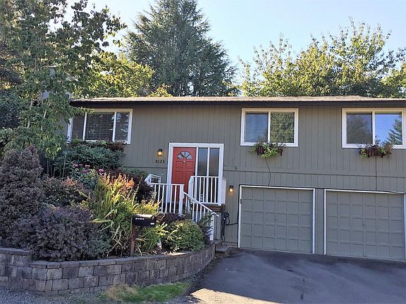 Front of home, 2 car garage and driveway
