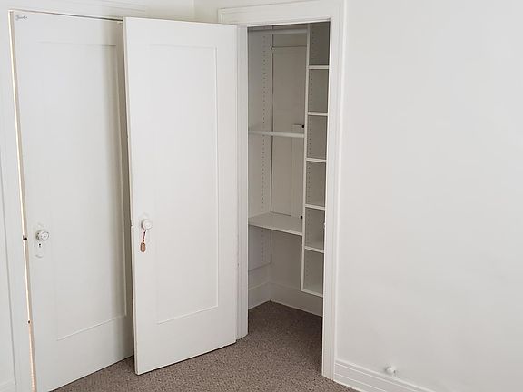 Custom closet in bedroom #1