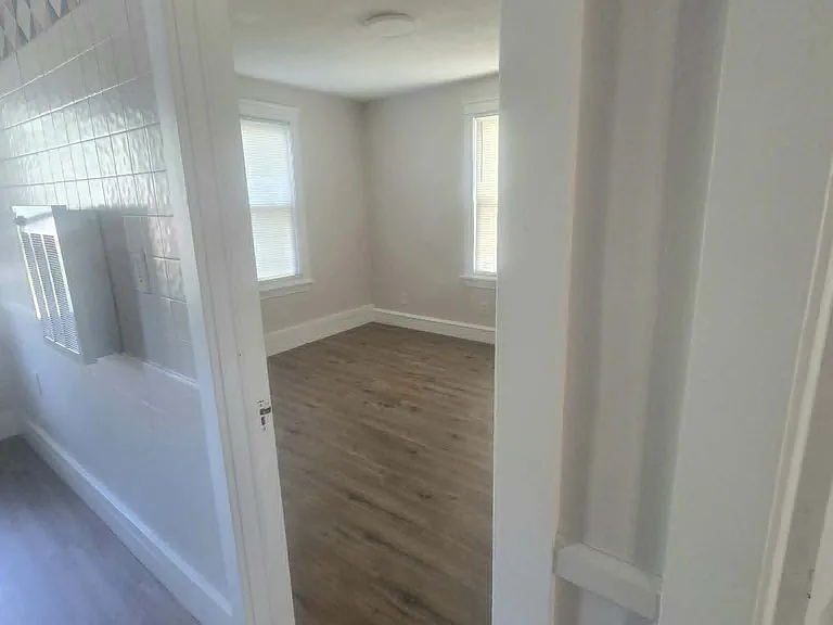Enter Bedroom 1 from Kitchen
