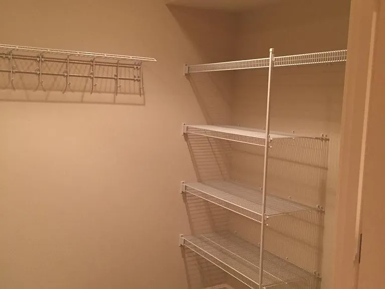 Walk in pantry with plenty of storage space on both sides