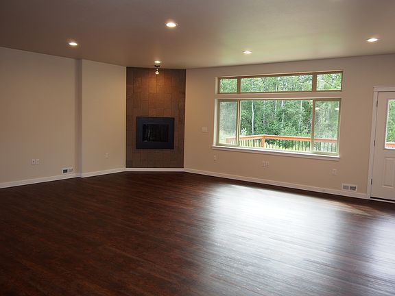 Open concept living facing creek
