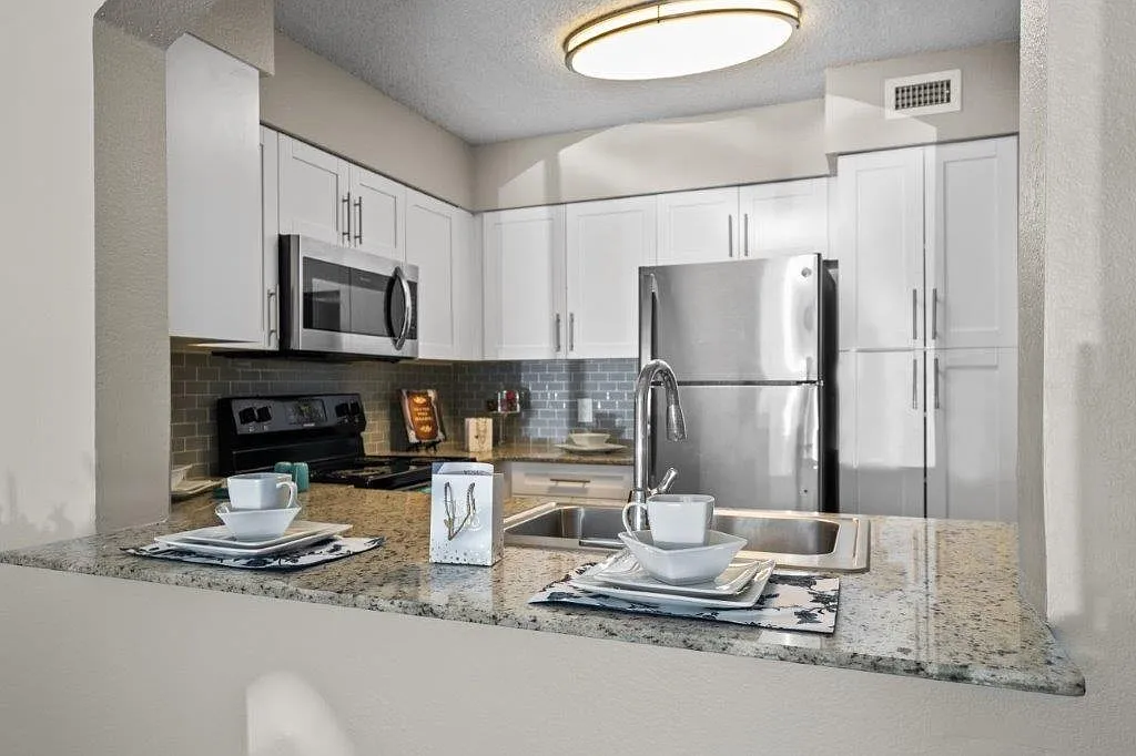 Mosaic Apartments — Photo 2