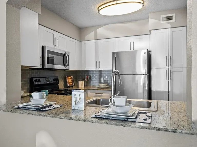 Mosaic Apartments — Photo 2