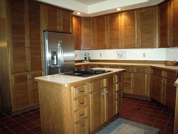 Upgraded gourmet island kitchen with stainless steel appliances