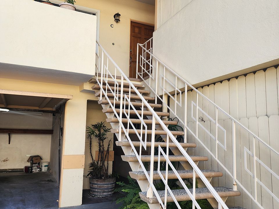 Private garage with stairs to unit