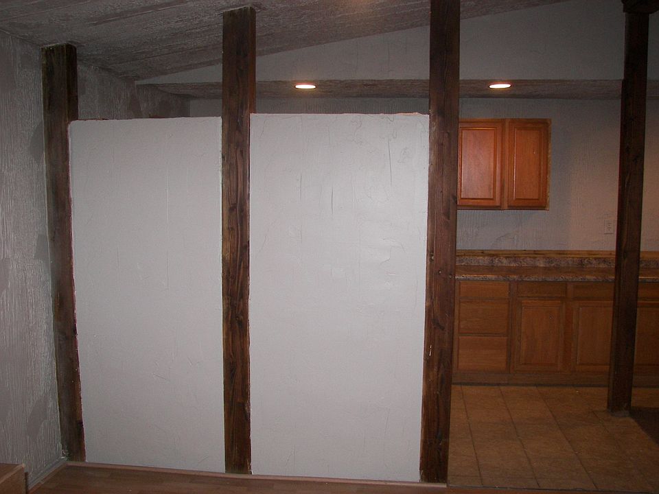 Wall dividing kitchen and living room area