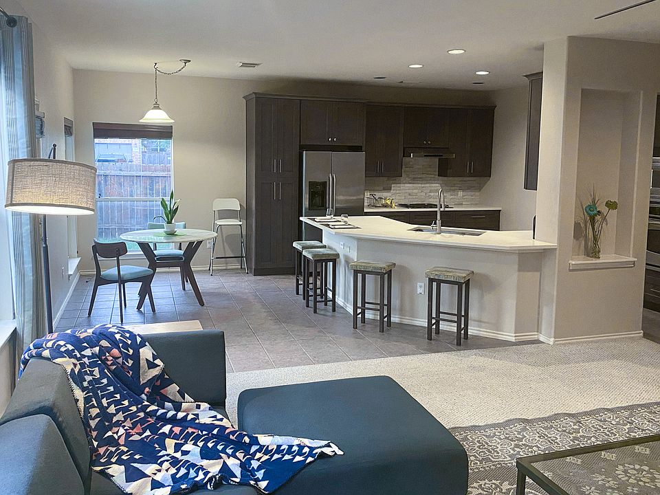 Open floor plan with living room flowing into the breakfast nook and kitchen.