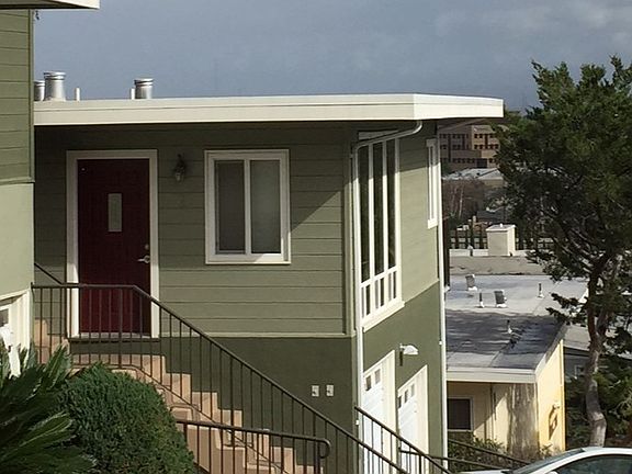 staircase and door to unit 1.