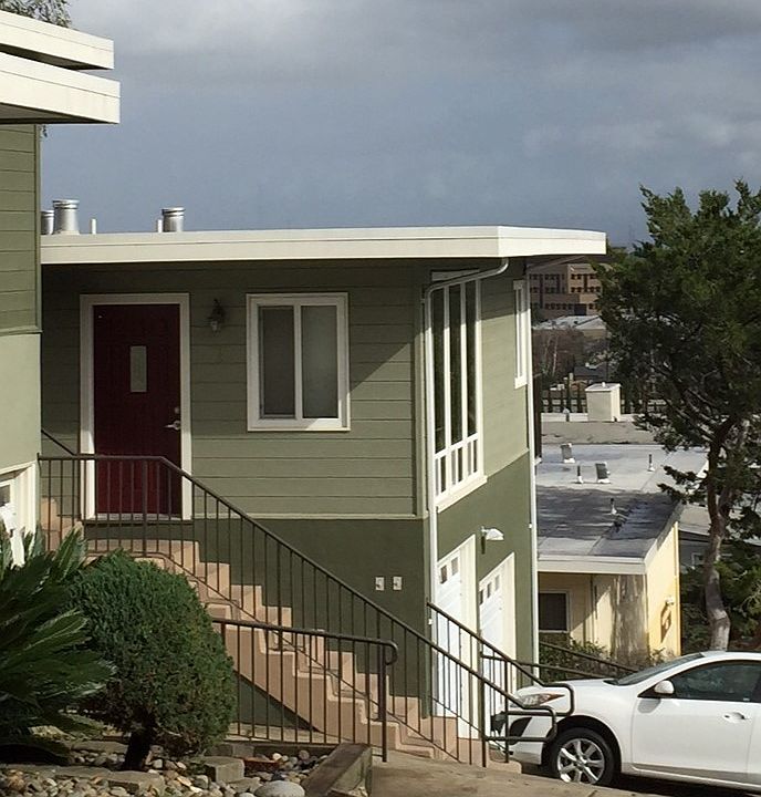 staircase and door to unit 1.