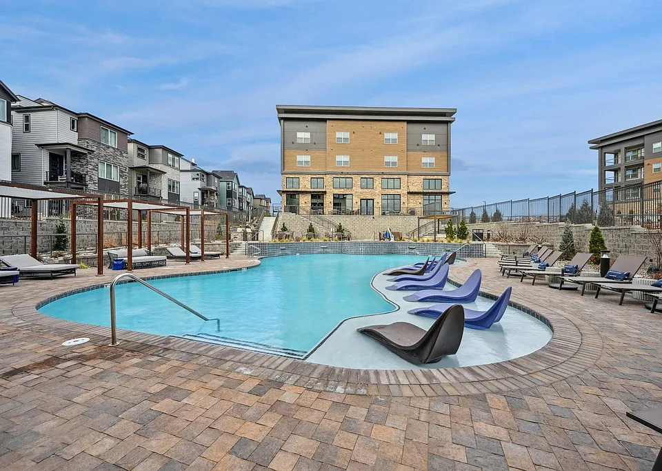 Resort-style Pool - Resort-style pool with sun shelf, cabanas and grills for relaxing and entertaining close to home.