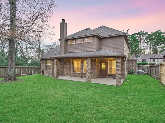 Fully fenced back yard provides plenty of spaces for endless possibilities.