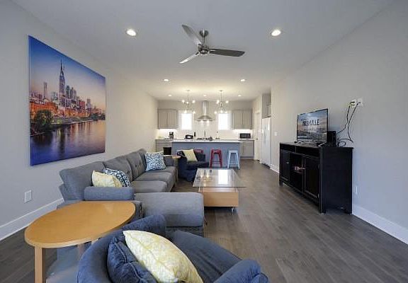 Gorgeous and modern living room. Love these floors.