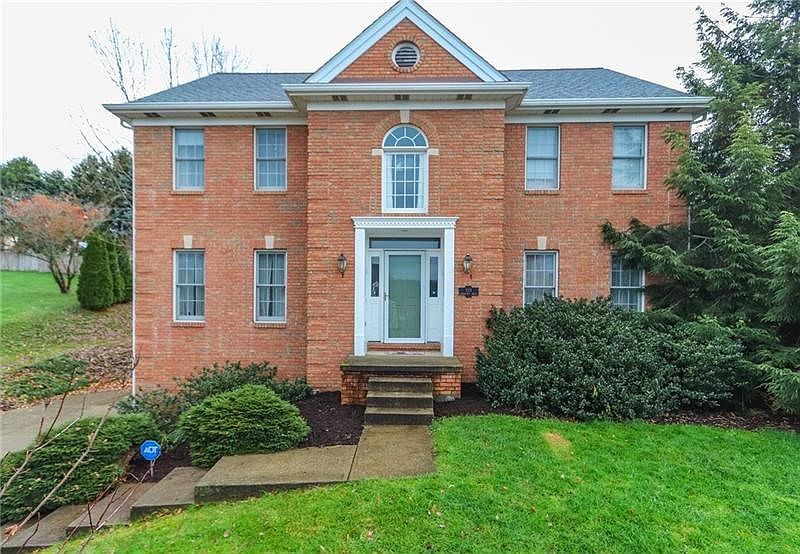 Attractive low maintenance 4 bedroom 2.5 bath home with brick front construction and 2 car garage located in the desired & lovel