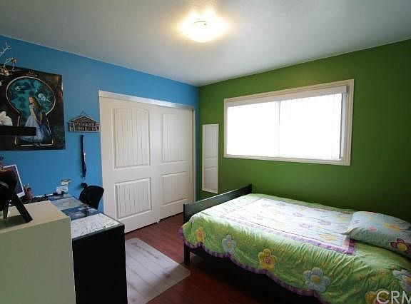 Bedroom #1 with special closet door panel.