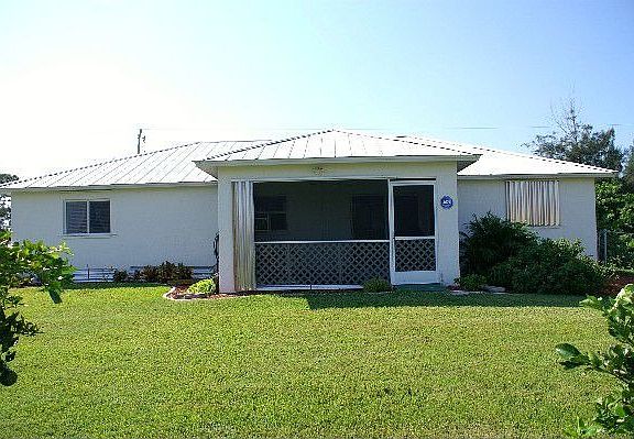 Lani & backyard w/fruit trees