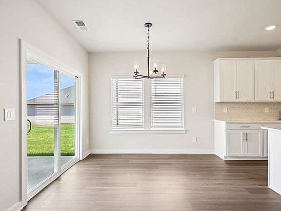 The open-concept floorplan allows for an easy flow between the kitchen and dining areas.