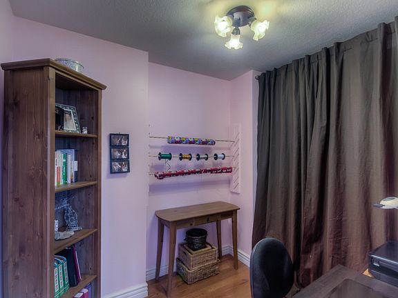 walk-in closet, currently used as office for mom