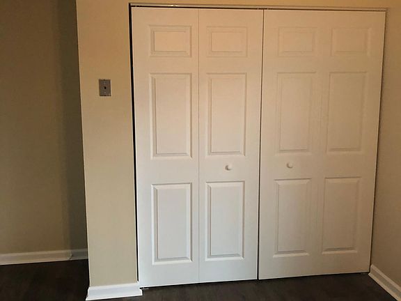 Kitchen pantry sliding door to ground level deck to the right