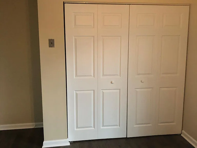 Kitchen pantry sliding door to ground level deck to the right