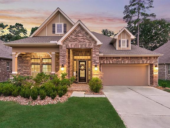 Instant curb appeal upon arrival with the beautiful landscaping and exterior stone detail.