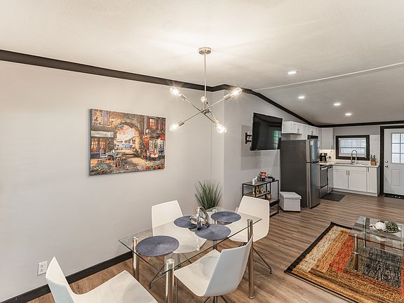 The dining and living room create a wide open space for all to enjoy