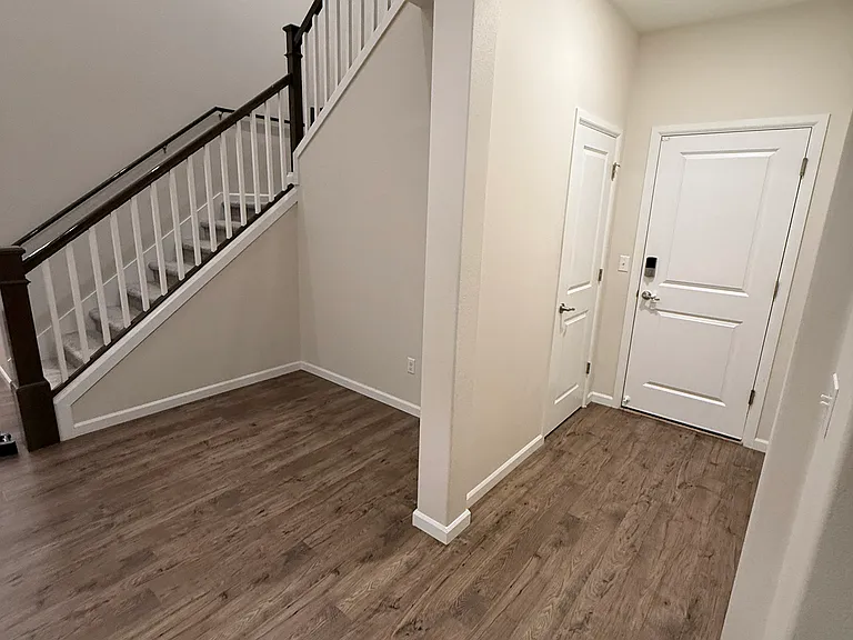 Conversation Area and door to garage