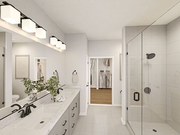 Luxurious Owner s Bath with Dual Sinks