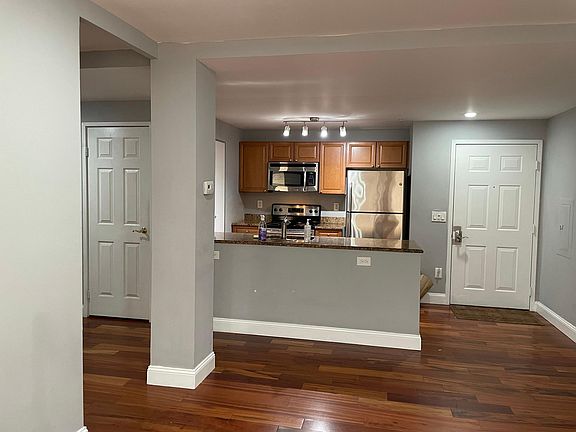 Front Door & Kitchen Area